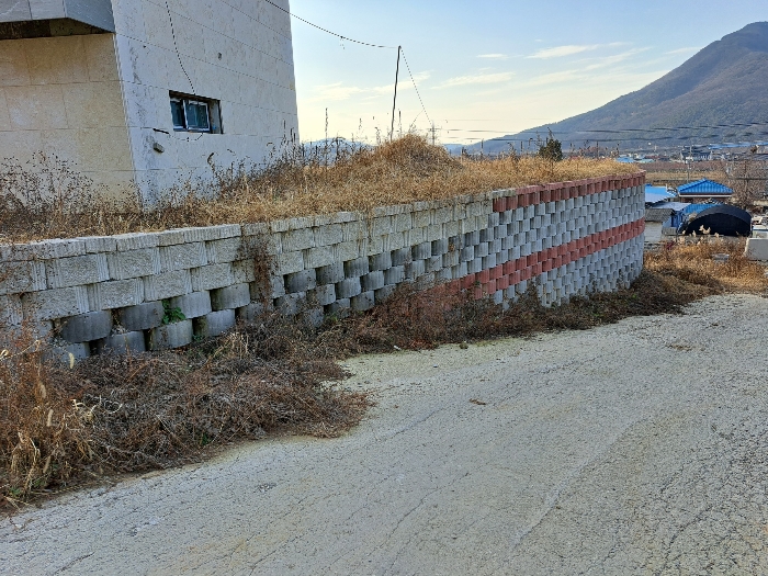 토지에 포함하여 평가하는 옹벽, 도로포장 등