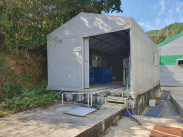 부동산표시 1,4번지상 제시외 건물(폐수처리장)전경