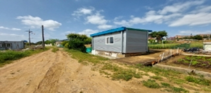 목록1 토지 일부(제시외 컨테이너박스) 전경