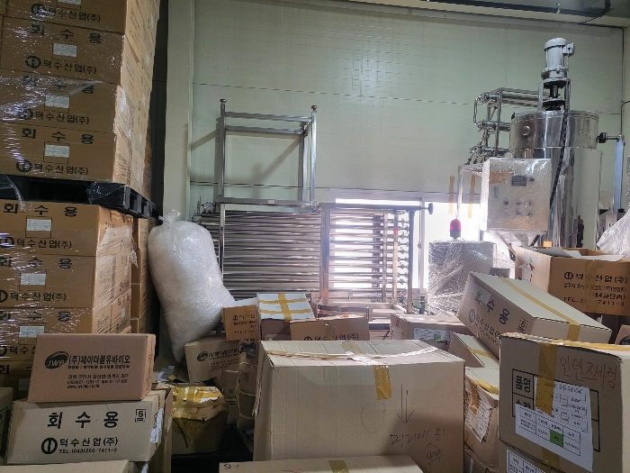 구성부분이 분리포장된 기계기구(기호(2),(16),(19)등)-기호(라) 1층 소재