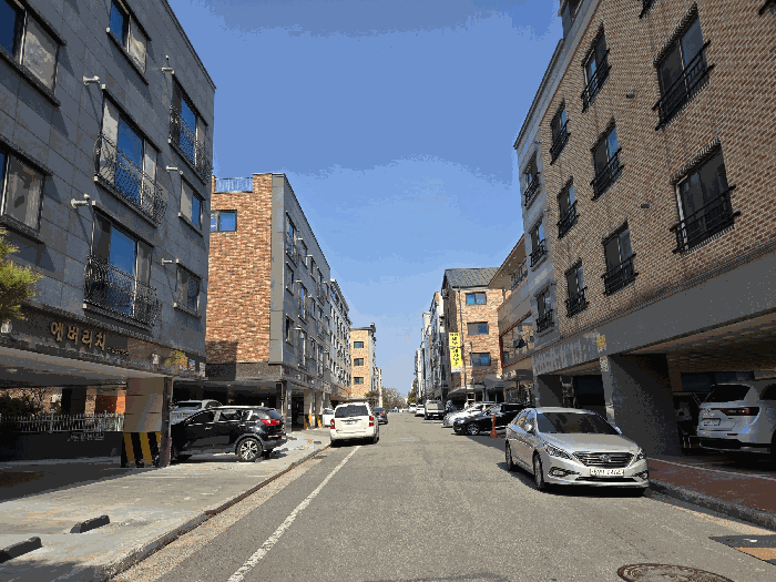 주위환경 1) 접면도로 남서측 전경