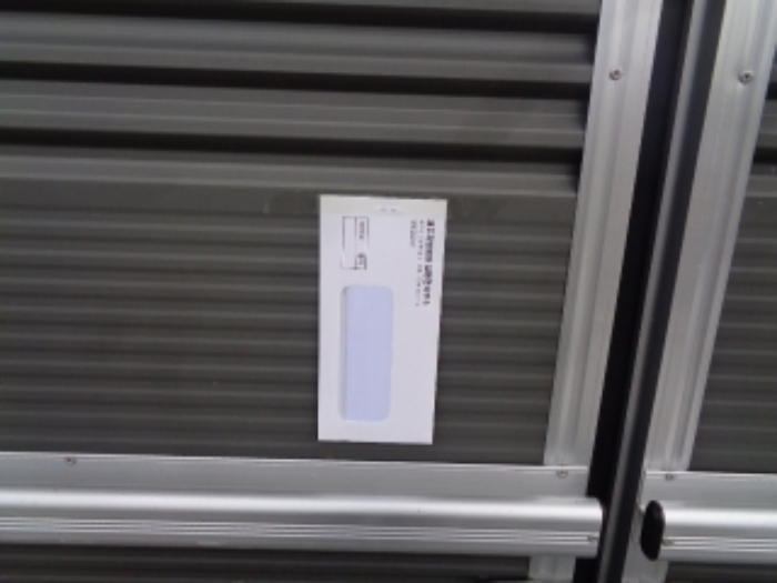 소재지3(광령평화2길 139, 나동)제시건물 출입문 안내문 부착사진