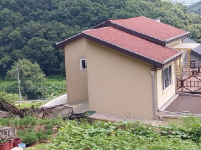 목록4 토지 일부를 포함한 토지 위에 신축된 건물(측면)
