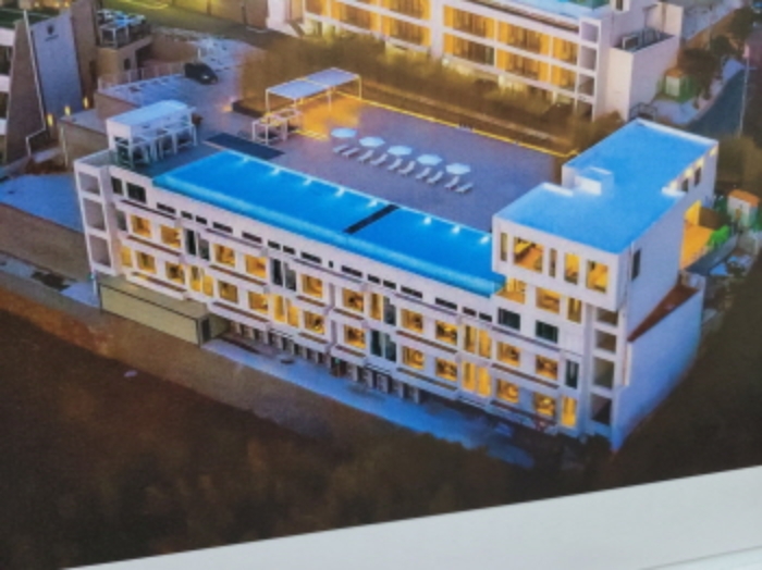 본건 조감도 사진( 사무실에 비취된 조감도 촬영함)