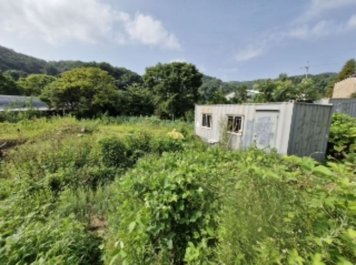 물건 3(내손동 87) 전경 - 도로쪽(토지 동북쪽)에서 본 사진