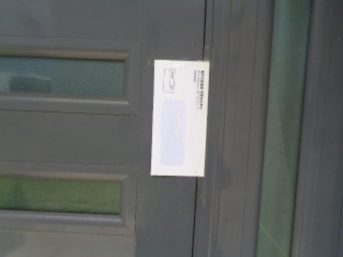 소재지2(사계남로50번길 19) 제시건물 현관 안내문 부착 사진