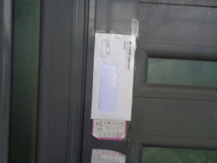 소재지6(사계남로50번길 19-7) 제시건물 현관 안내문 부착 사진