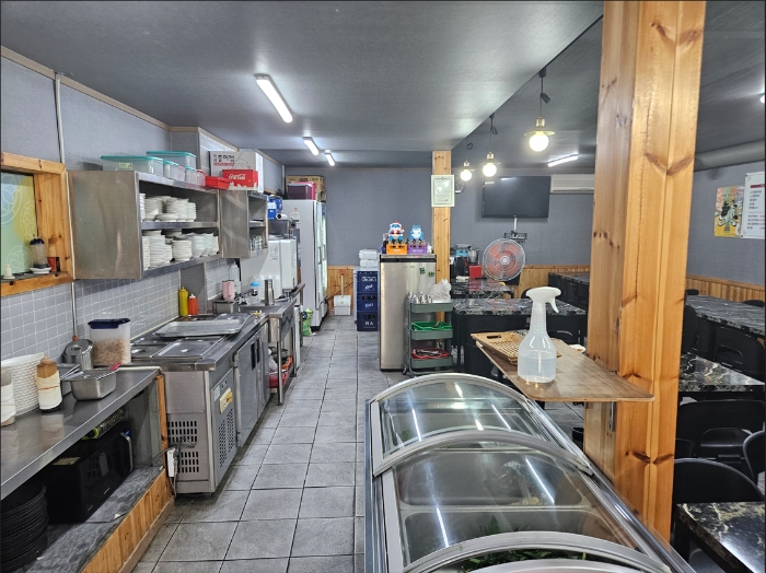 1층 내부 및 제시외 물건 ㉠