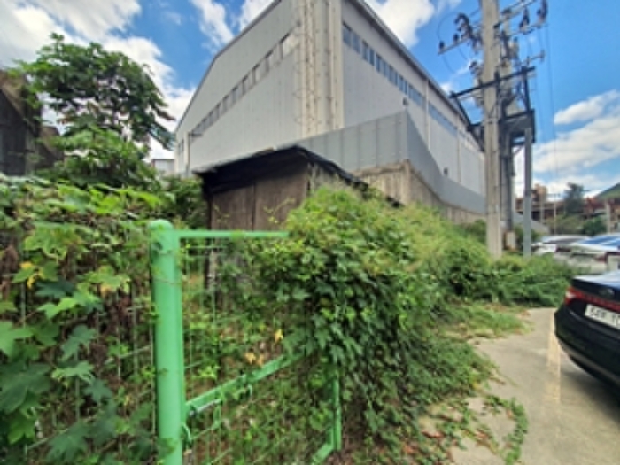 기호4 지상 제시외 목조 창고(농막)