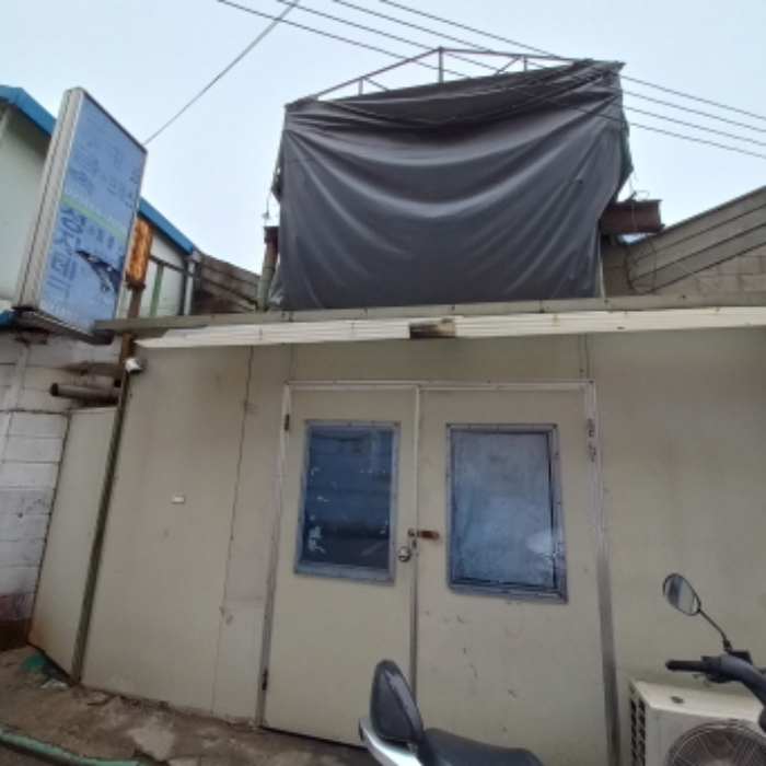 부성장식(우측에서 6번째 건물, 부성장식 간판은 없는 상태)