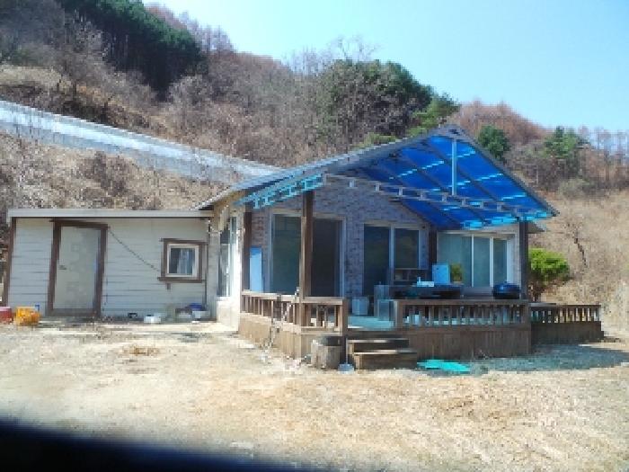 사진29번 [목록번호4번 부동산 제시외 건물 ㄱ.ㄴ  전경]