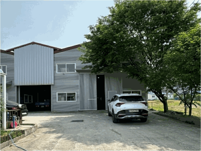 본건(기호1[토지], 기호2[건물, 가동]) 및 인근전경