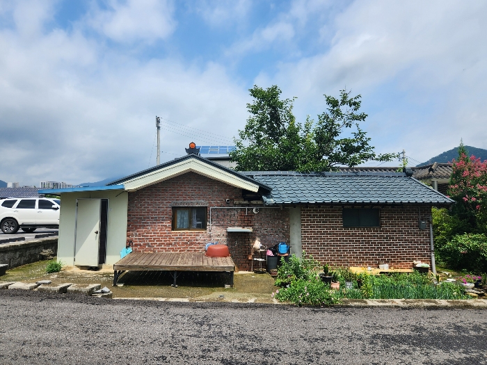 기호 1,2,3 토지 및 기호 4-가,4-나 건물, 제시외건물㉠