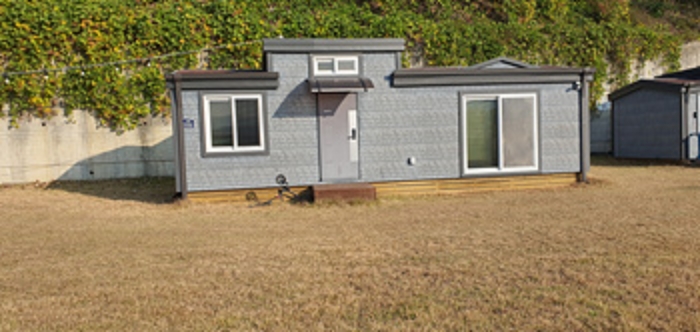 기호2 토지 및 기호6 제시 건물 전경