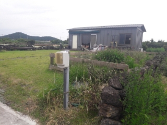 소재지1.(신천리 396-15) 대지 및 지상 제시외 건물(ㄱ)