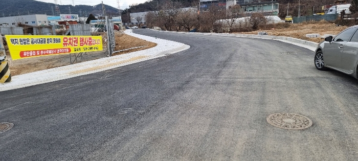 금산토지구획사업지구 진입도로 전경