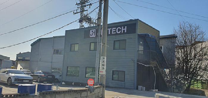 기호1 토지 및 기호2 제시 건물 전체 전경