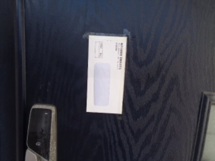 소재지1(사계북로41번길 128-19) 제시건물 현관 안내문 부착 사진