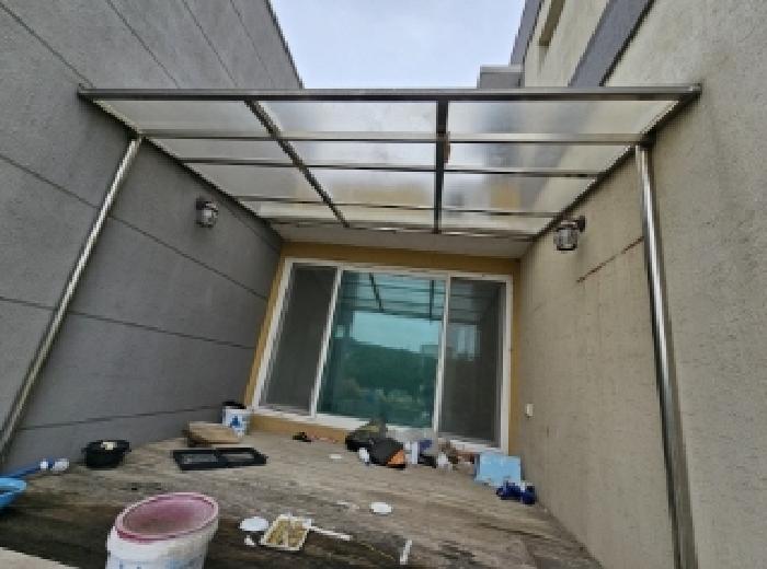 목록 4번 지상의 목록 2번 전경(목적건물 가동 및 가동건물 남측에 연접한 차양시설)