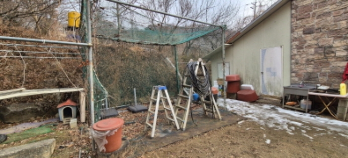 제시외 건물 1.(건물에 덧붙여 지은 창고부분)