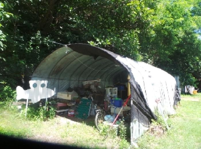 사진23번 [목록번호1번 부동산 일부 지상에 소재하는 것으로 목측되는 제시외 하우스 전경] 