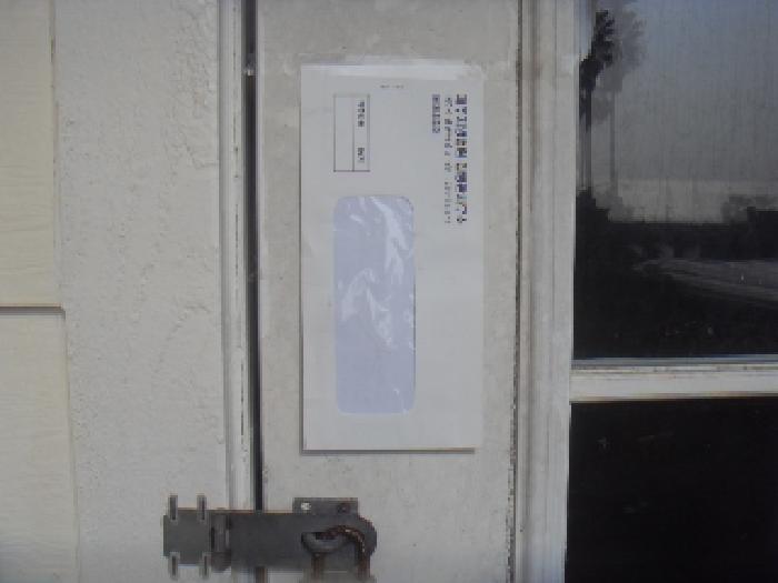 소재지1(대포동 2062) 지상 소재지2(이어도로 139) 제시건물 1층 출입문 안내문 부착 사진