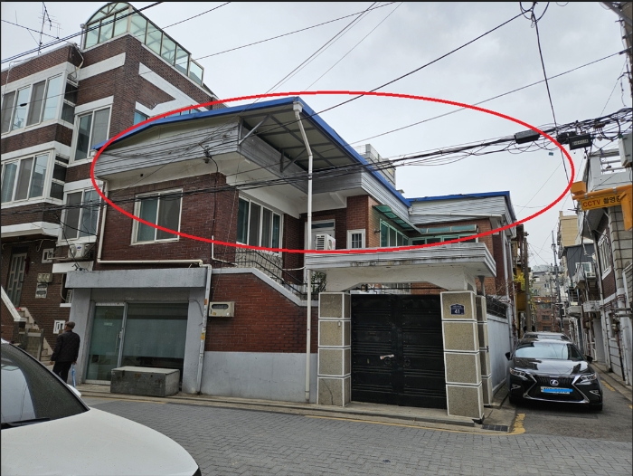 제시외 물건 ㉠