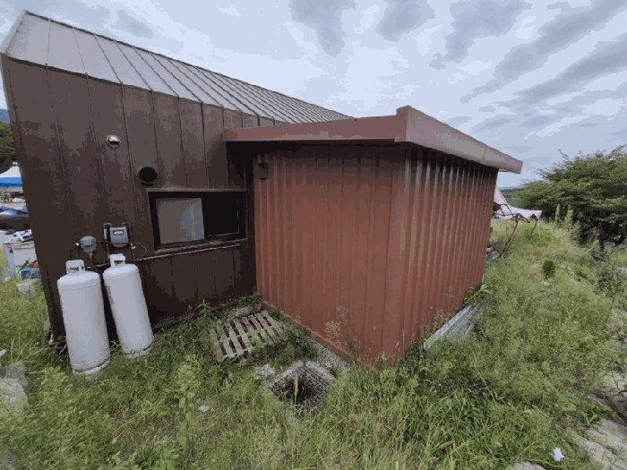 제시외건물(부합물 및 종물) ㉠