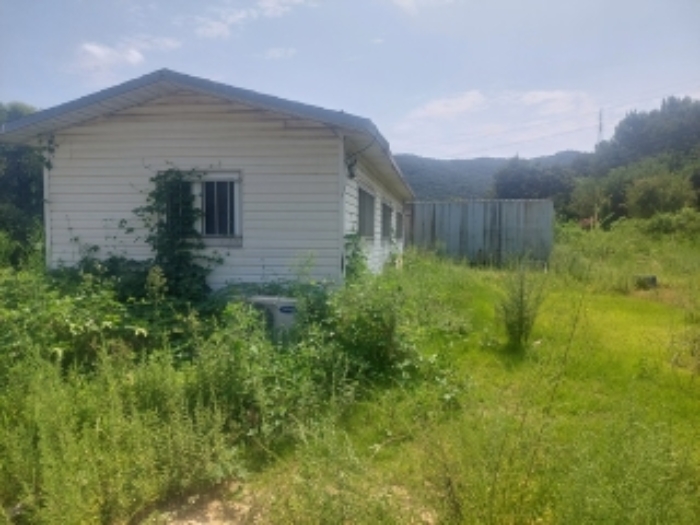 부동산 표시목록 7번 - 주택과 컨네이너 존재