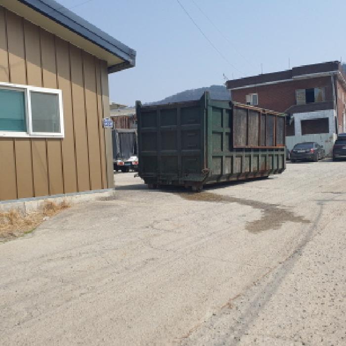 본건 제시목록1 입구 토지 및 건물G동 모습