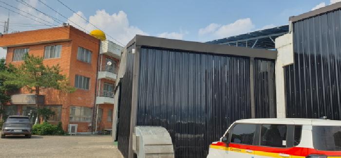 단층 공장의 제시외 확장부분