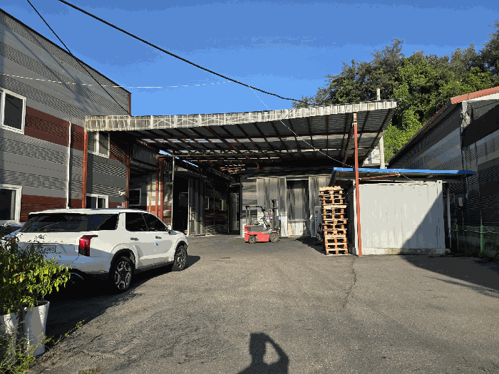 제시외 건물 등 ㉠