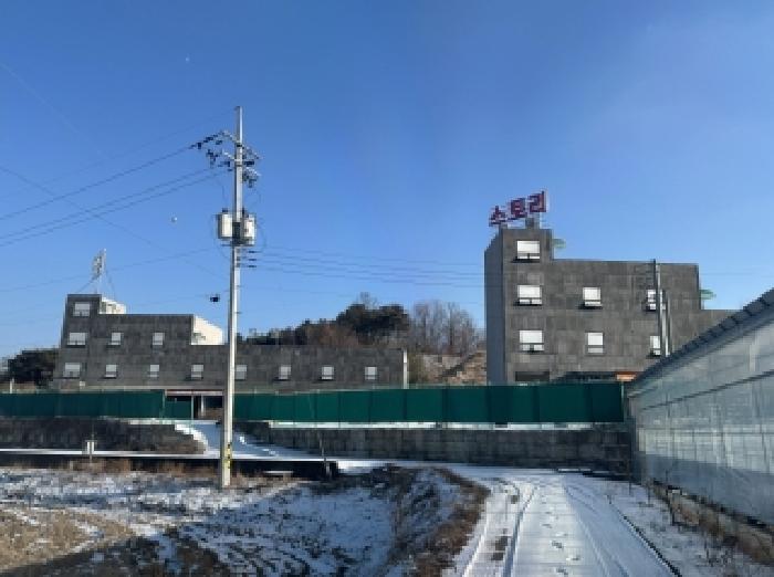 본건